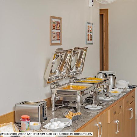 Itsy Hotels Deluxe Inn شيناي المظهر الخارجي الصورة