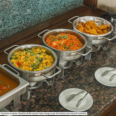 Itsy Hotels Deluxe Inn شيناي المظهر الخارجي الصورة